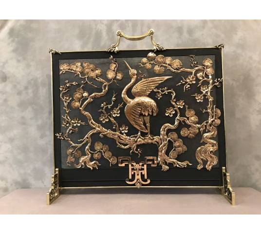 Pare fire screen of antique fireplace in bronze and vintage brass circa 1900
