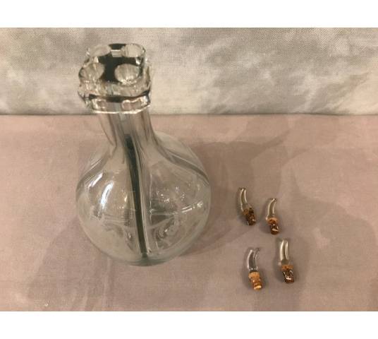 Bouteille carafe à liqueurs à 4 compartiments en cristal gravé d'époque 19 ème