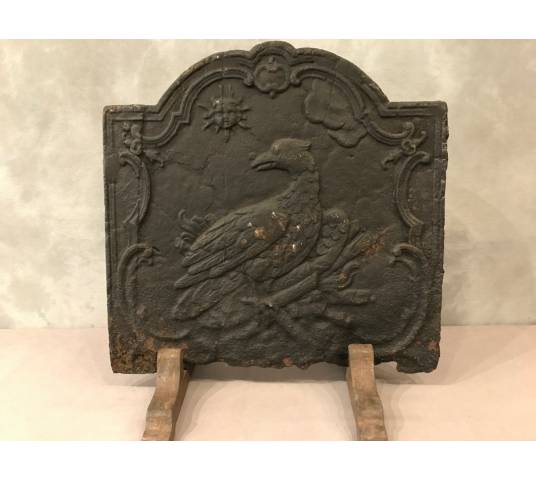 Ancient fireplace insert plate at the beginning of the 19th century