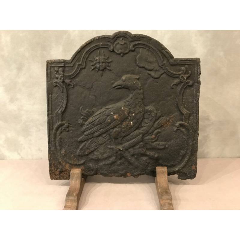 Ancient fireplace insert plate at the beginning of the 19th century