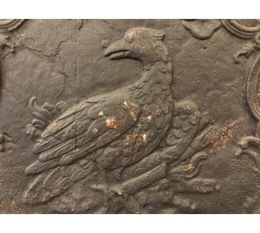 Ancient fireplace insert plate at the beginning of the 19th century