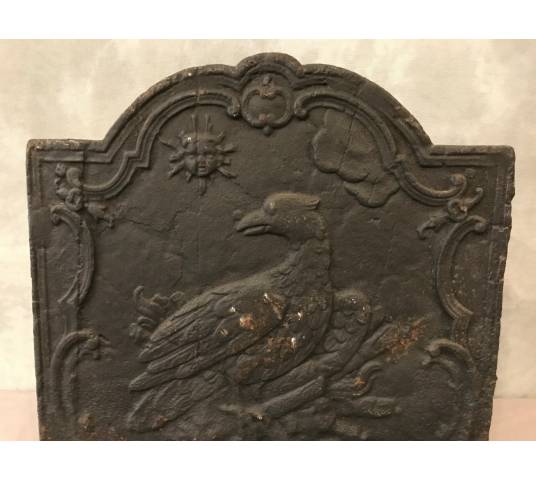 Plaque de cheminée ancienne en fonte d'époque début 19 ème