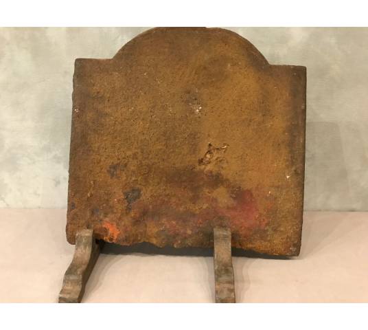 Ancient fireplace insert plate at the beginning of the 19th century