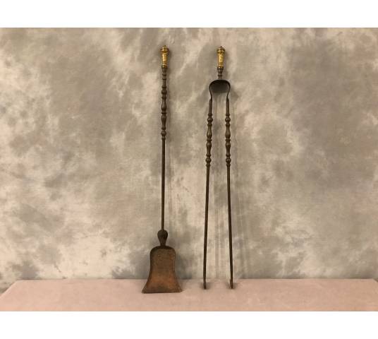 Set of a shovel and an iron fireplace and gilded bronze fireplace 19 th