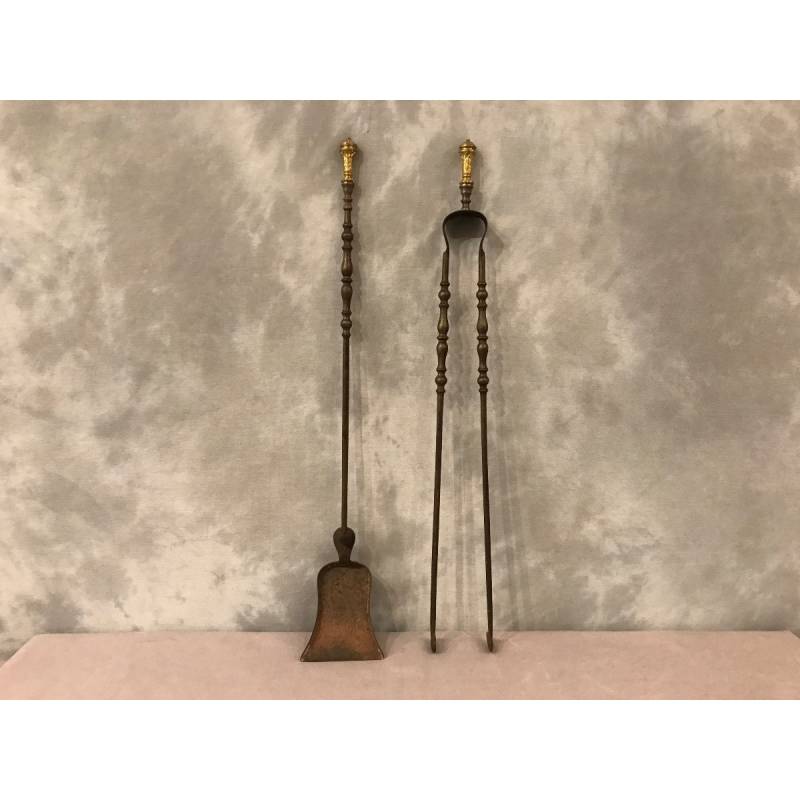 Set of a shovel and an iron fireplace and gilded bronze fireplace 19 th