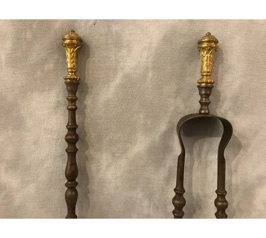 Set of a shovel and an iron fireplace and gilded bronze fireplace 19 th