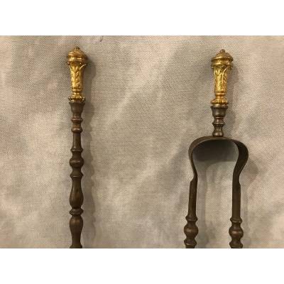 Set of a shovel and an iron fireplace and gilded bronze fireplace 19 th
