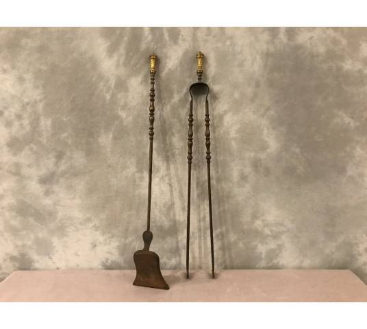 Set of a shovel and an iron fireplace and gilded bronze fireplace 19 th
