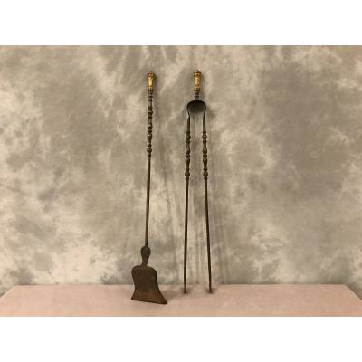 Set of a shovel and an iron fireplace and gilded bronze fireplace 19 th