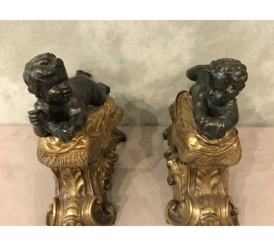 Old, golden kennels in gilded bronze and vintage 19 th