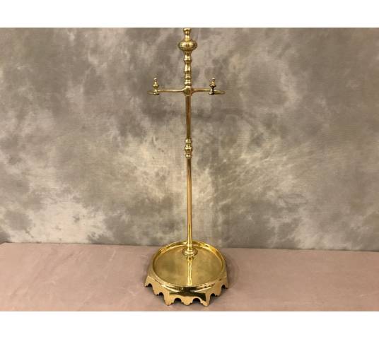 Servant in polished brass and vintage varnish 19 th