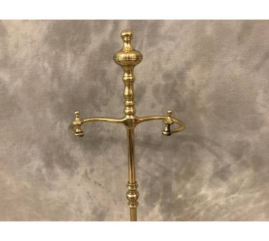 Servant in polished brass and vintage varnish 19 th