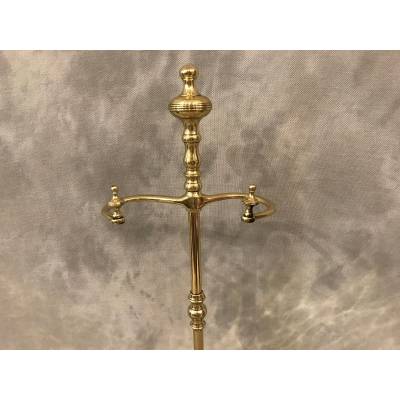 Servant in polished brass and vintage varnish 19 th