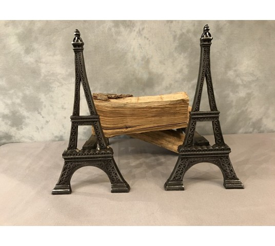 Ancient channels in polished cast iron around 1900 representing the Eiffel Tower