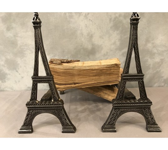 Ancient channels in polished cast iron around 1900 representing the Eiffel Tower