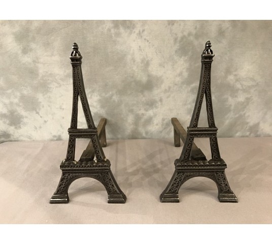 Ancient channels in polished cast iron around 1900 representing the Eiffel Tower