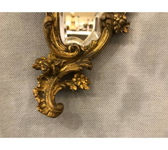 Hand-to-hand mirror in gilded bronze 19 th