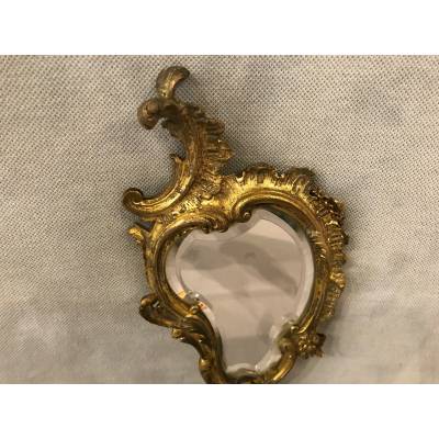 Miroir face à main en bronze doré d'époque 19 ème