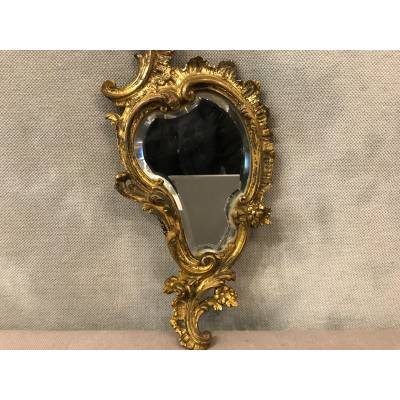 Hand-to-hand mirror in gilded bronze 19 th