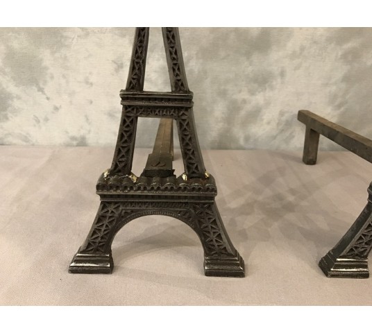 Ancient channels in polished cast iron around 1900 representing the Eiffel Tower