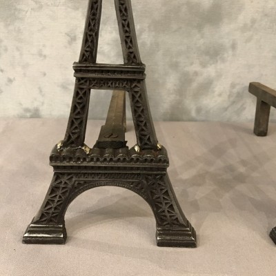 Ancient channels in polished cast iron around 1900 representing the Eiffel Tower