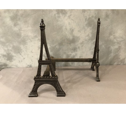 Ancient channels in polished cast iron around 1900 representing the Eiffel Tower