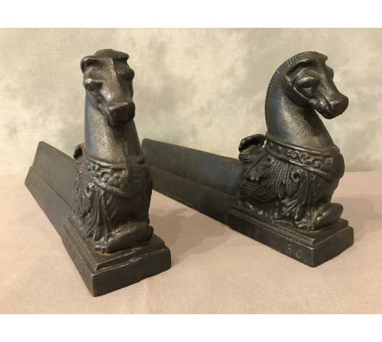 Pair of old cast iron tracks representing horses