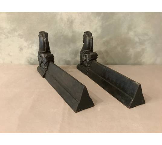 Pair of old cast iron tracks representing horses