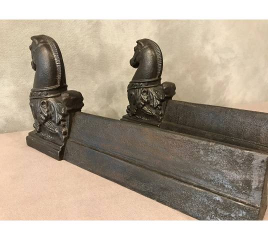 Pair of old cast iron tracks representing horses