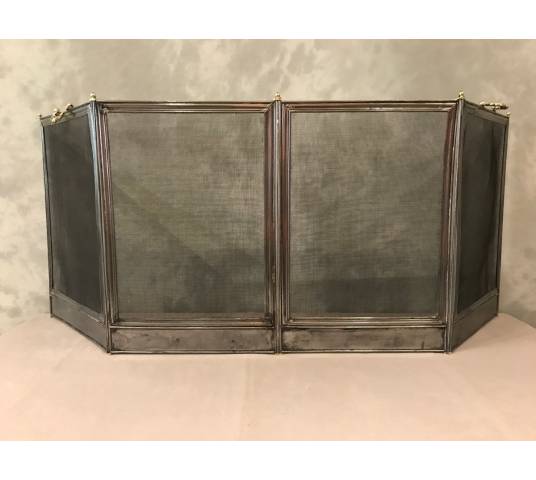 Pare fireplace old in polished iron 19 th Charles X