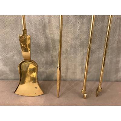 Set of 3 pieces of bronze and brass fireplace accessories from the 19th century