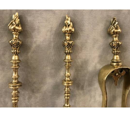 Set of 3 pieces of bronze and brass fireplace accessories from the 19th century
