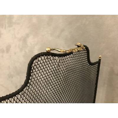 Old blackened iron fireplace firewall from the 19th century