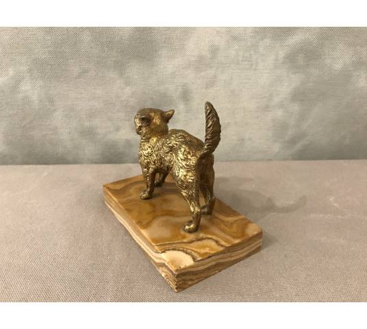 Small bronze cat on a marble base from the late 19th century