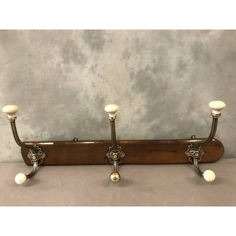 Brass and ceramic coat rack bar from the late 19th century