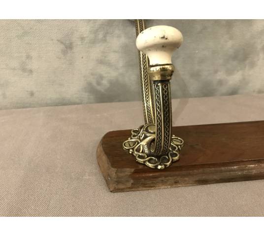 Brass and ceramic coat rack bar from the late 19th century