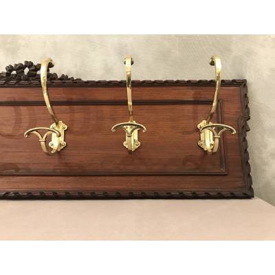 Set of 6 coat racks, bronze coat hooks on wood from the 19th century