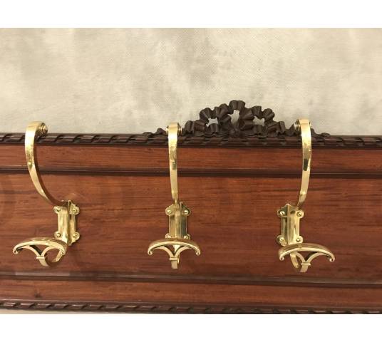 Set of 6 coat racks, bronze coat hooks on wood from the 19th century