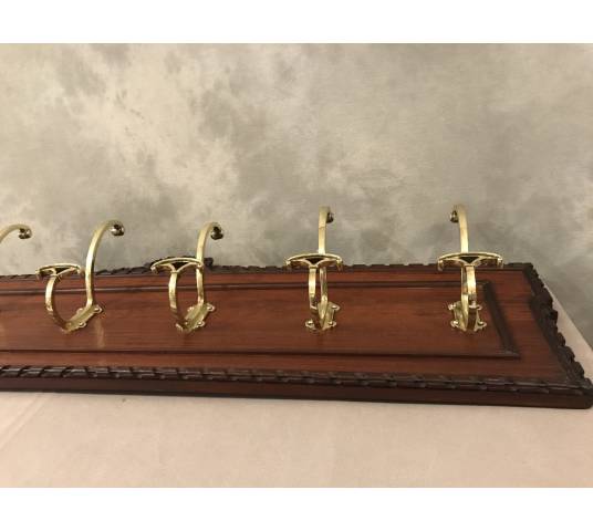 Set of 6 coat racks, bronze coat hooks on wood from the 19th century
