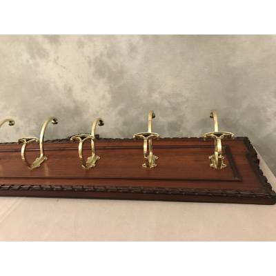 Set of 6 coat racks, bronze coat hooks on wood from the 19th century