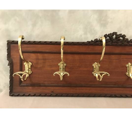 Set of 6 coat racks, bronze coat hooks on wood from the 19th century