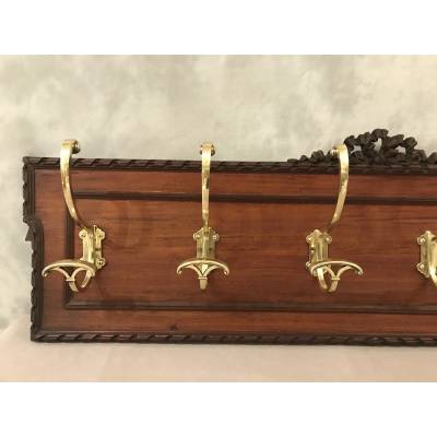 Set of 6 coat racks, bronze coat hooks on wood from the 19th century