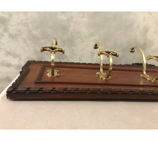 Set of 6 coat racks, bronze coat hooks on wood from the 19th century