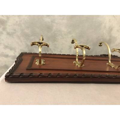 Set of 6 coat racks, bronze coat hooks on wood from the 19th century