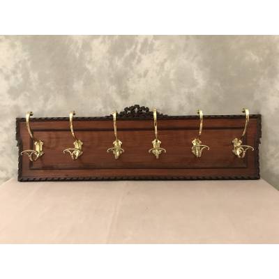 Set of 6 coat racks, bronze coat hooks on wood from the 19th century