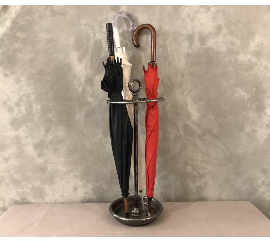 Old round cast iron umbrella stand from the late 19th century