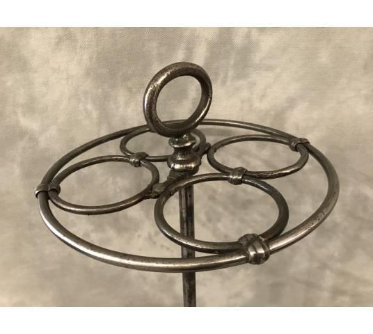 Old round cast iron umbrella stand from the late 19th century