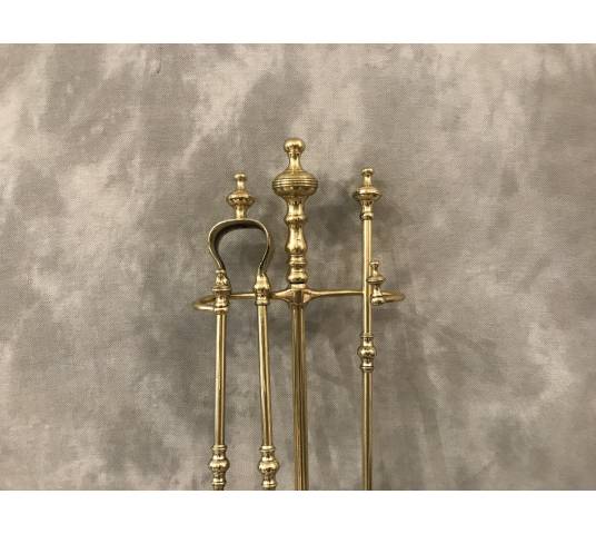 Brass fireplace servant from the 19th century