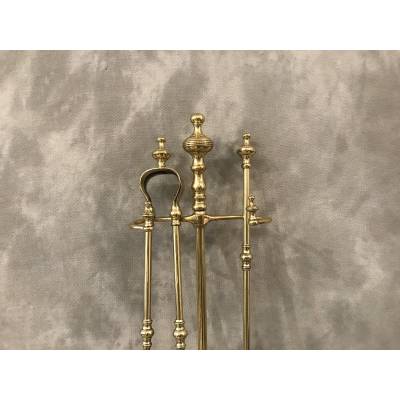Brass fireplace servant from the 19th century
