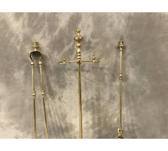 Brass fireplace servant from the 19th century